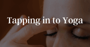 Woman tapping fingers on eyebrow